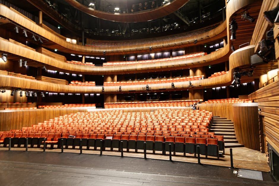 Modern theatre interior with illuminated seating