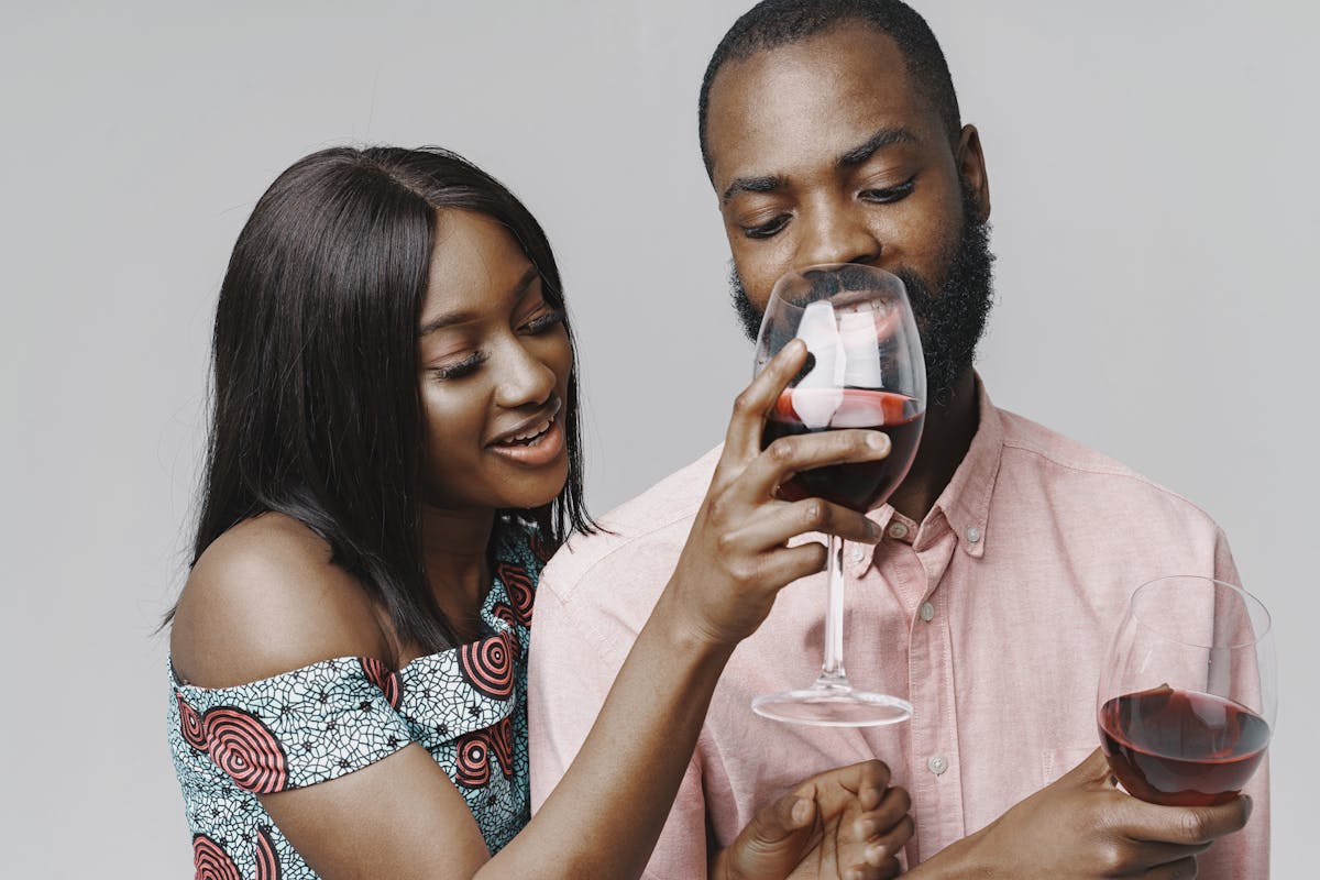 Couple wine tasting at a vineyard