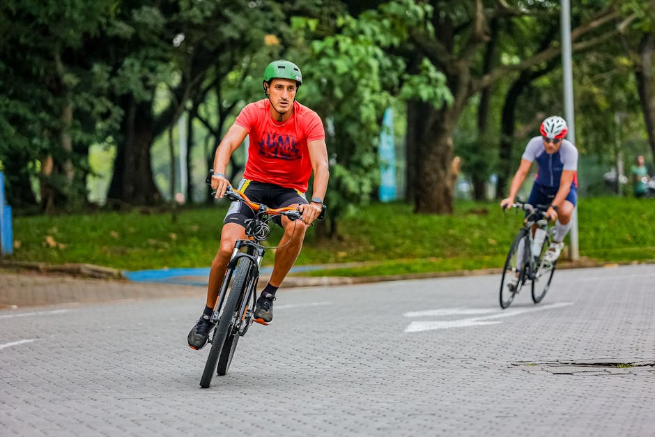 Cyclists riding on a paved park trail for Toronto outdoor cycling activities