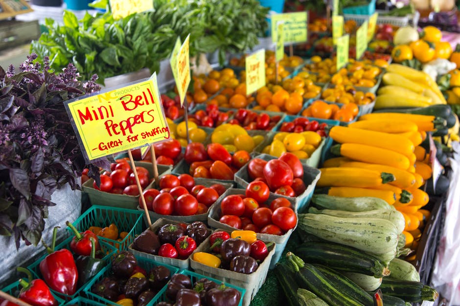 Fresh vegetables and produce displayed at a farmers market similar to Toronto St Lawrence Market