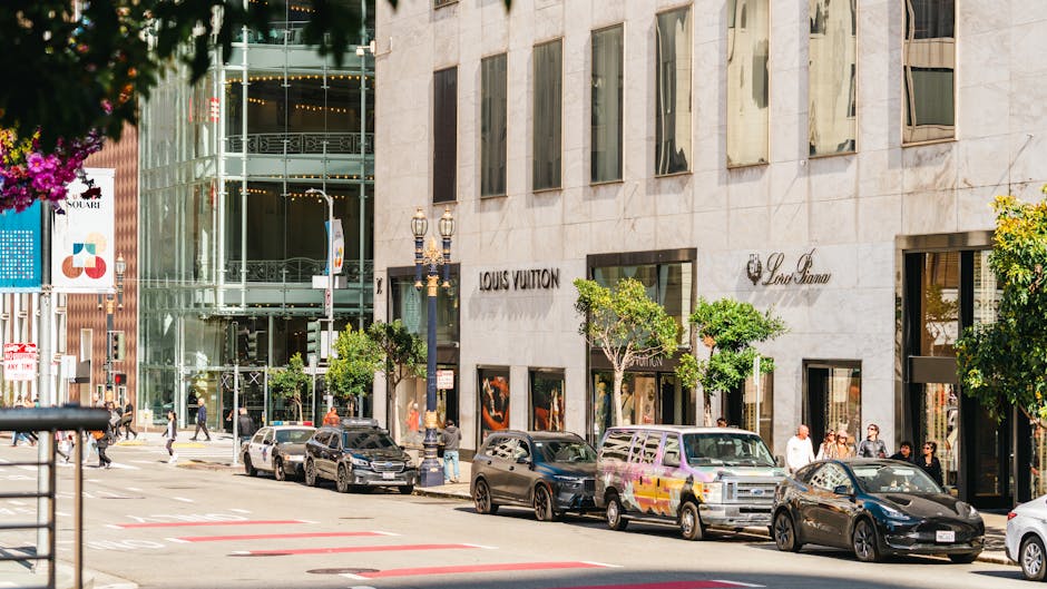 Luxury shopping street with designer brand storefronts similar to Toronto Bloor-Yorkville