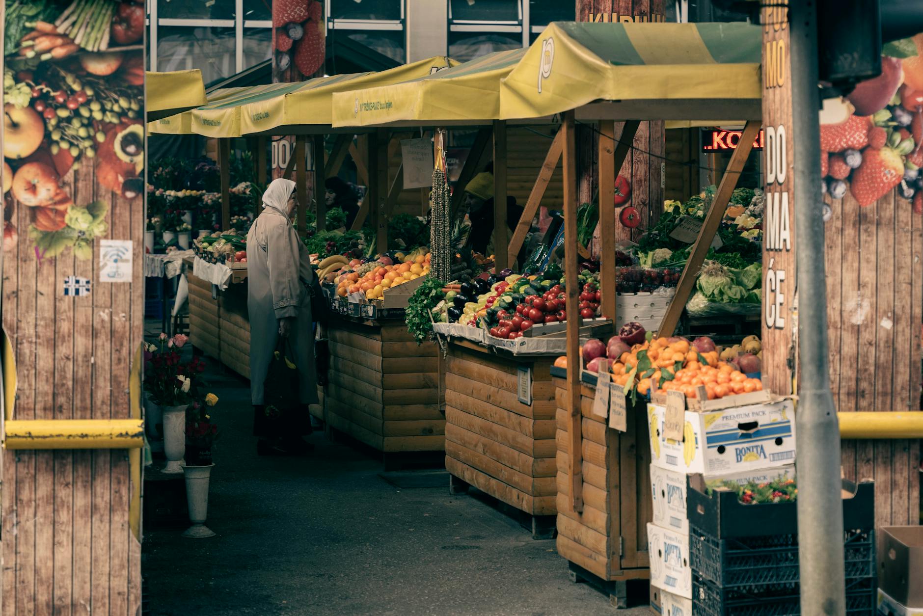 St. Lawrence Market Toronto vendor stall with fresh produce and food