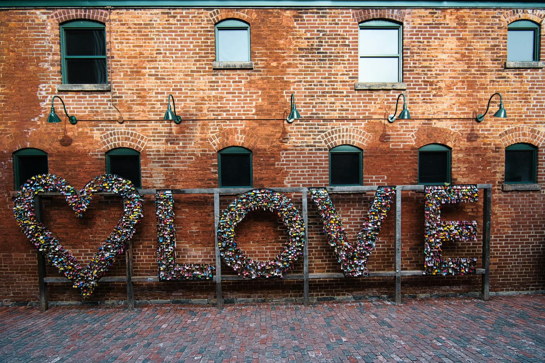 Toronto Distillery District cobblestone street with Victorian brick buildings