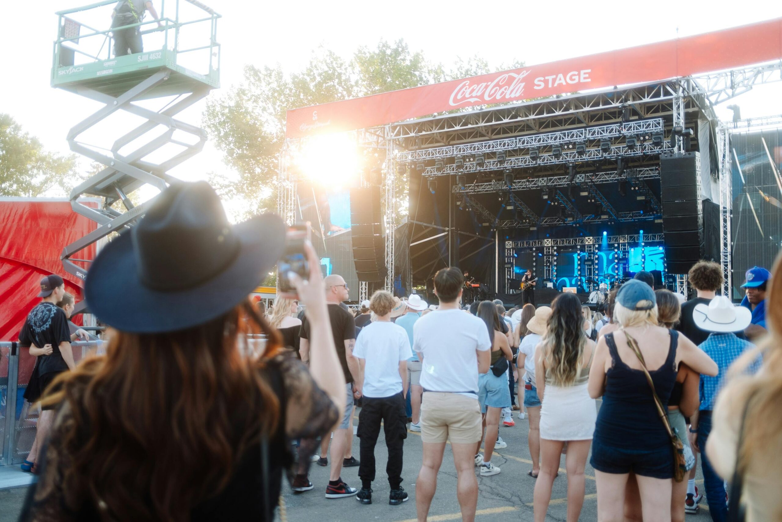 Large crowd gathered at Toronto summer festival enjoying outdoor entertainment and community celebration
