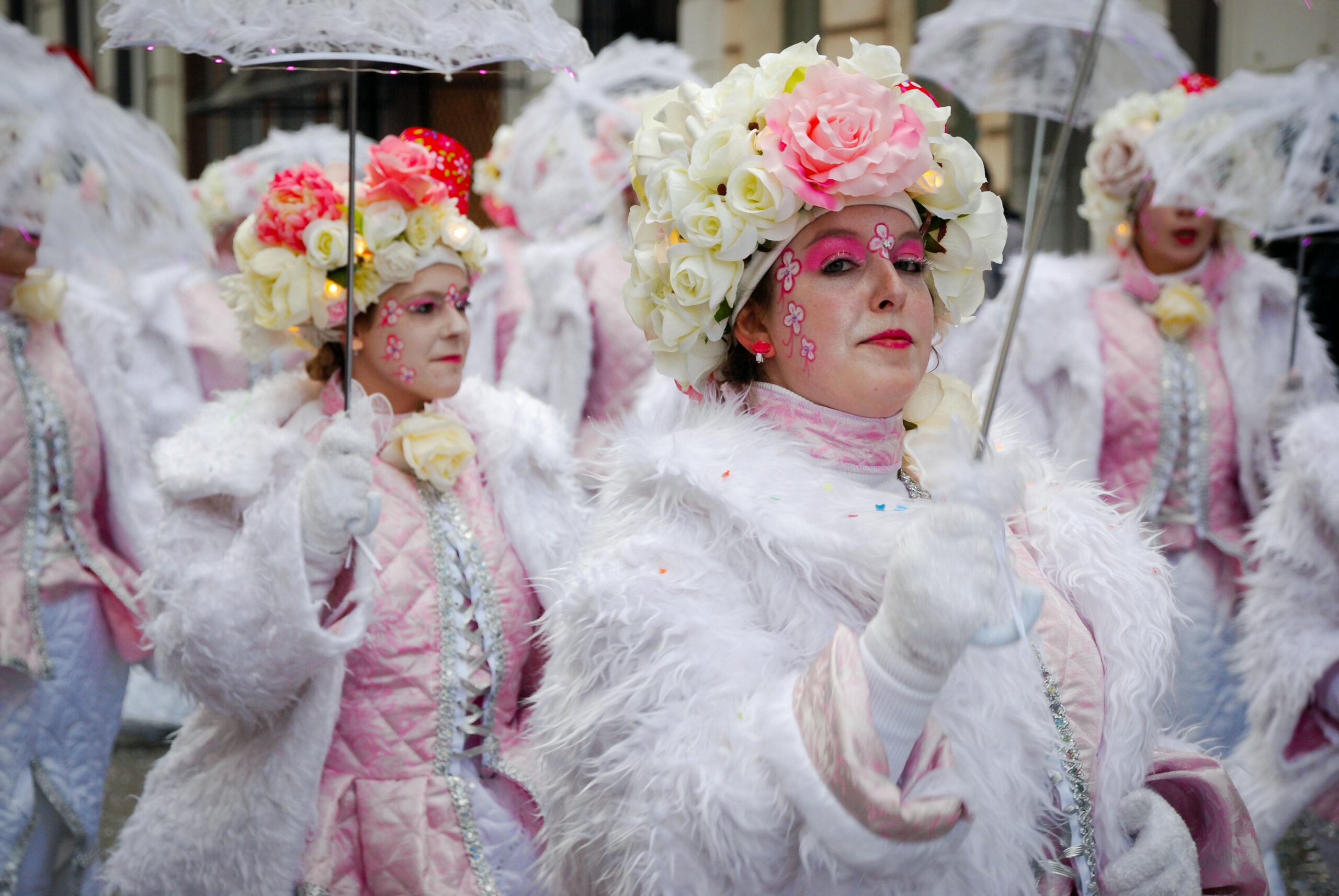 Colorful carnival parade floats and performers at Toronto Caribana festival with dancers in traditional costumes