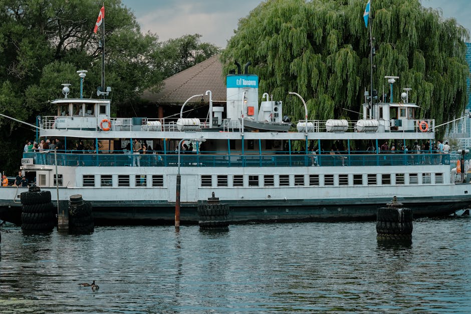 Toronto Island Ferry docked with passengers ready for a scenic harbour crossing