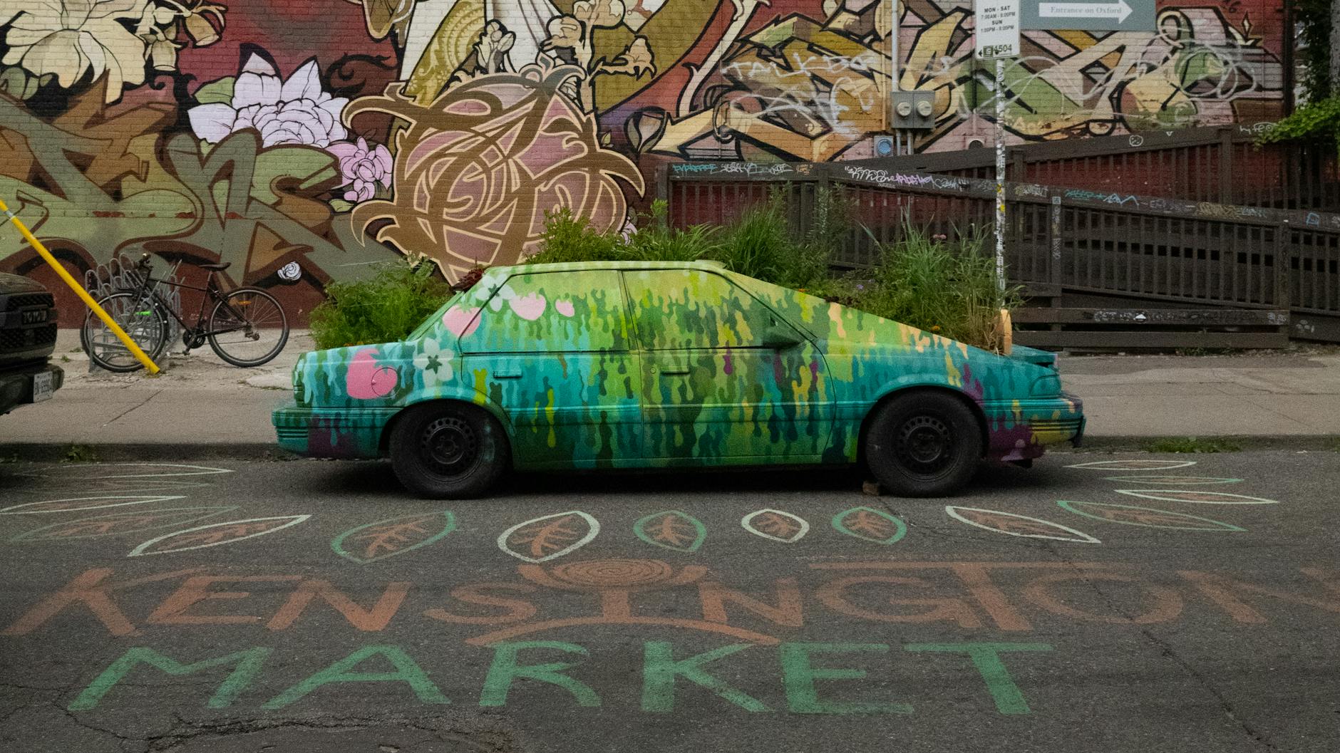 Kensington Market Toronto colourful street art and storefronts