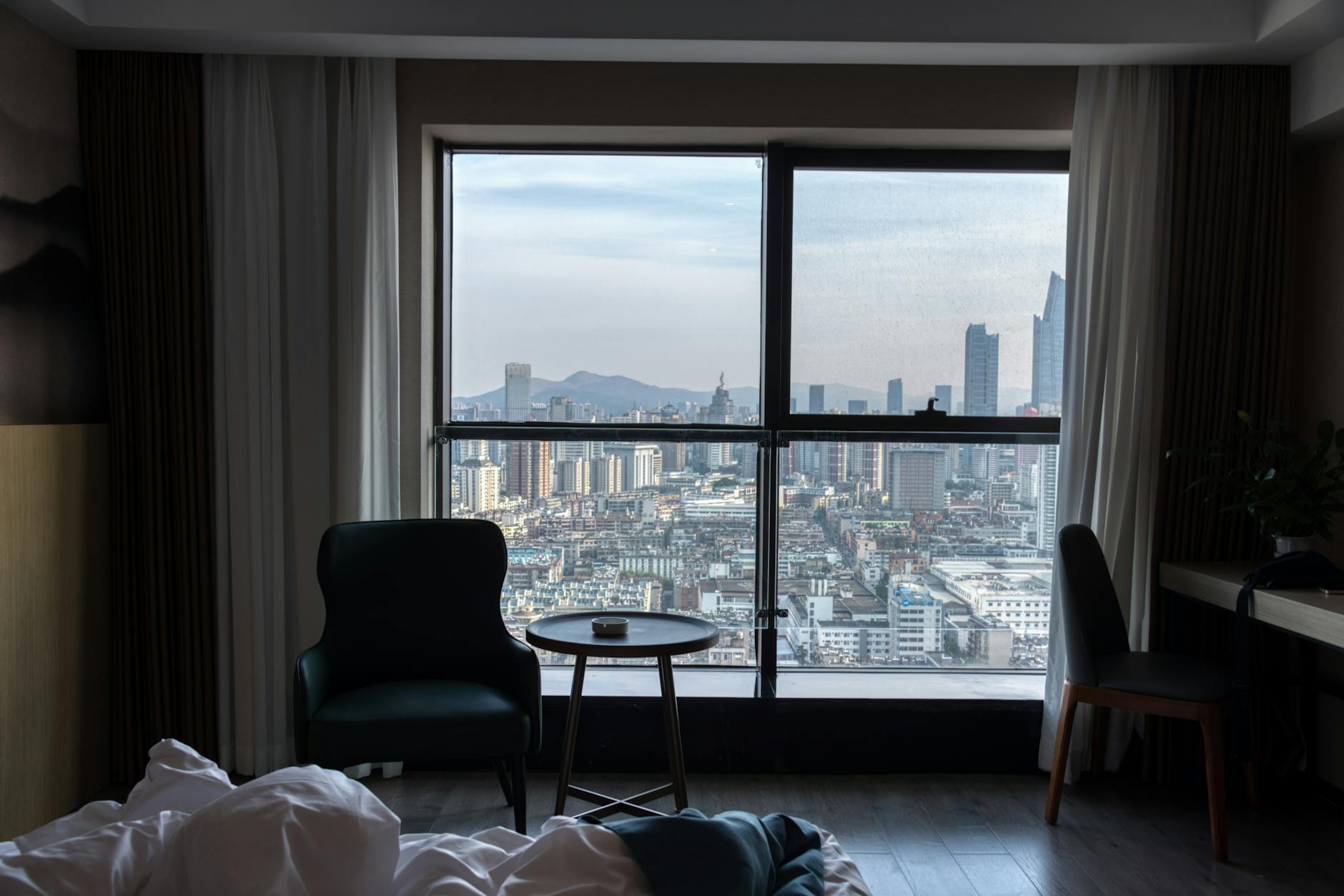 Modern luxury hotel room with city skyline view Toronto