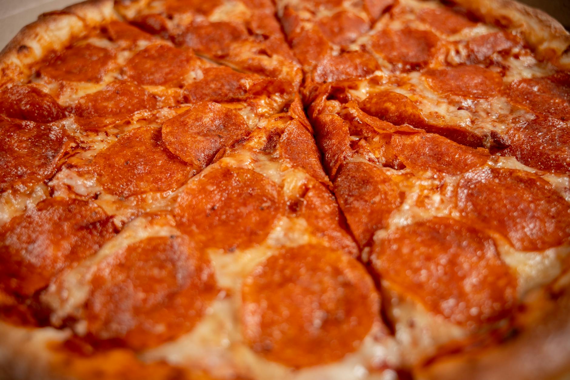 Best pizza Toronto slice with pepperoni and cheese close-up
