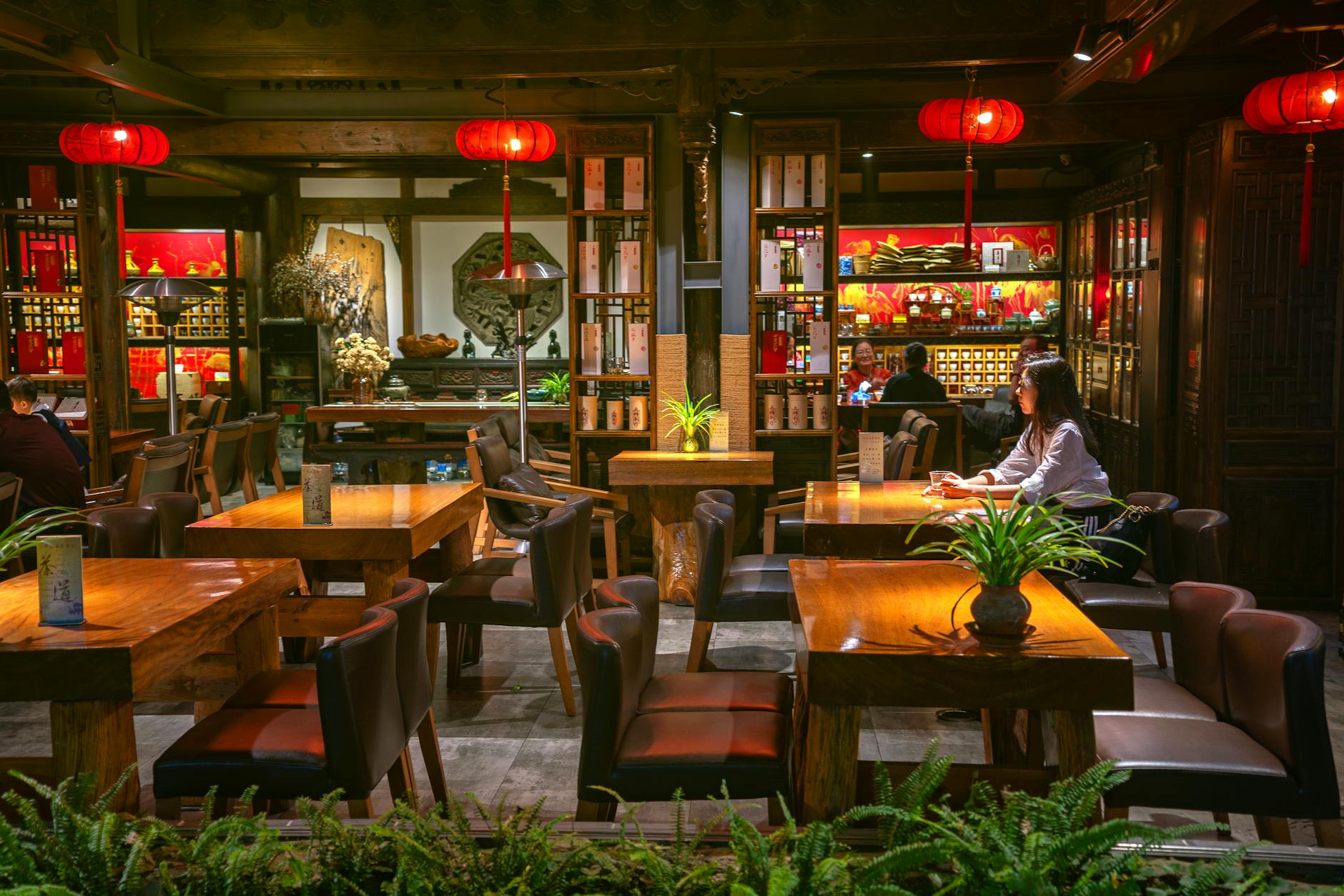 Chinatown Toronto restaurant interior with red lanterns and customers