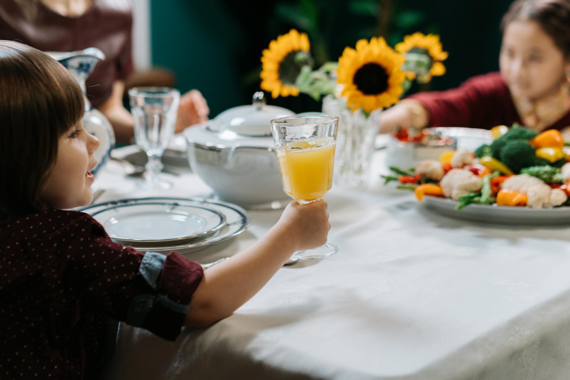 Family restaurants Toronto kids dining table happy meal together