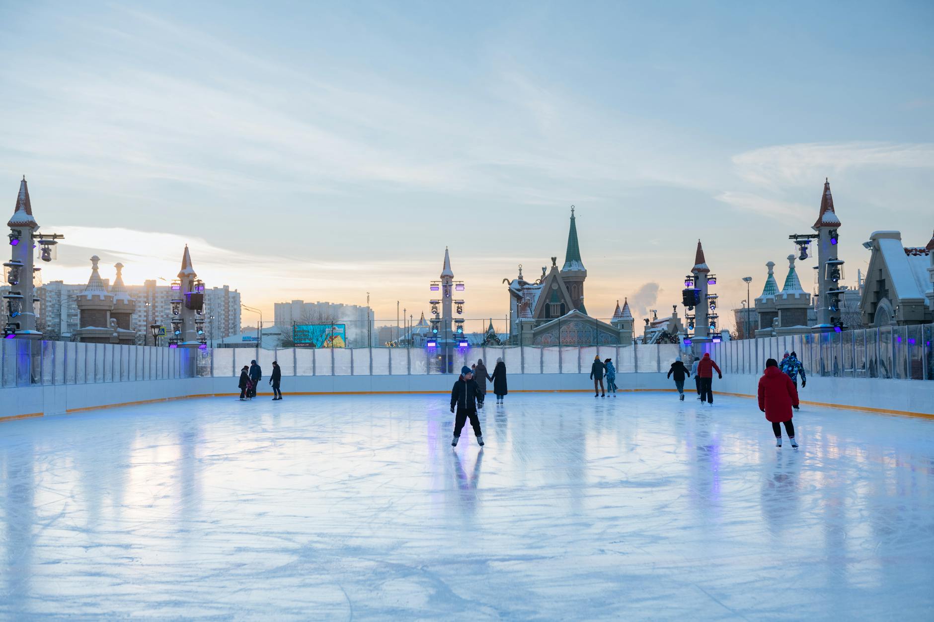 Ice skating Toronto outdoor rink lights skaters families winter evening