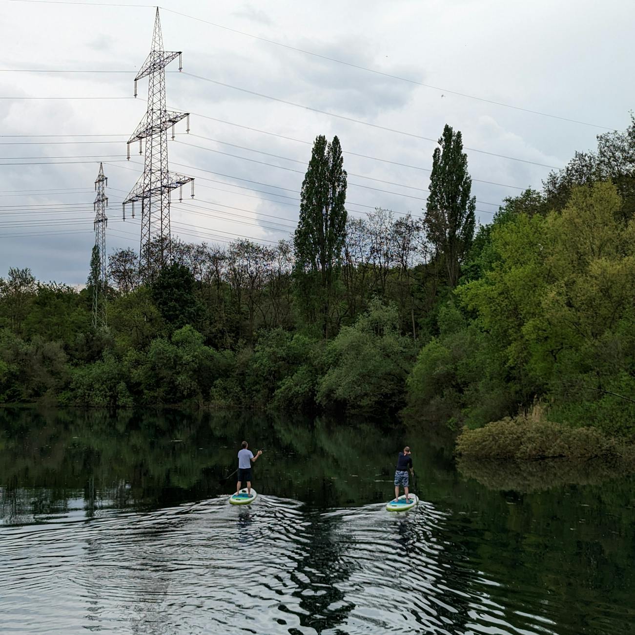 Kayaking Toronto stand-up paddleboarding lake water reflection