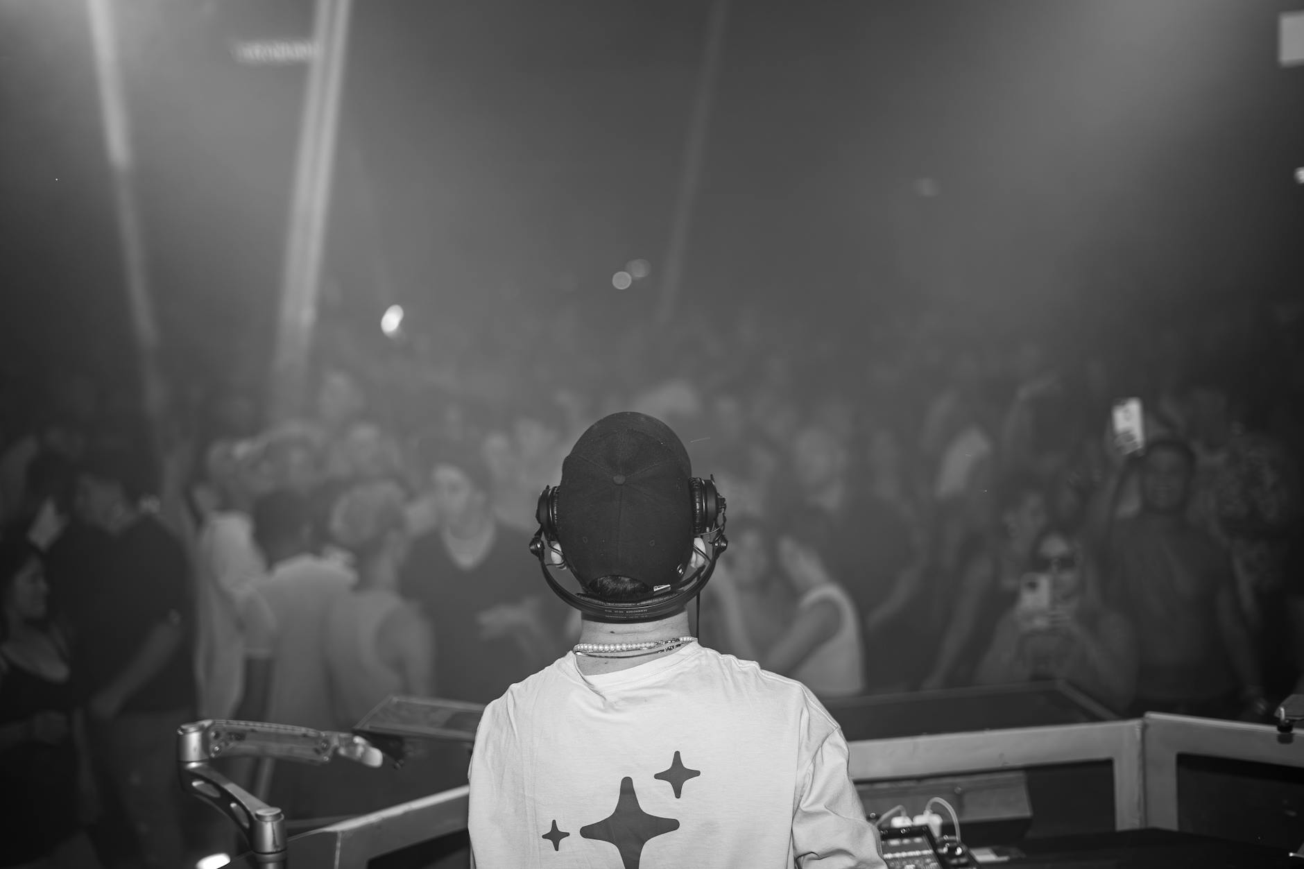 Toronto nightclub DJ turntables crowd dancing lasers