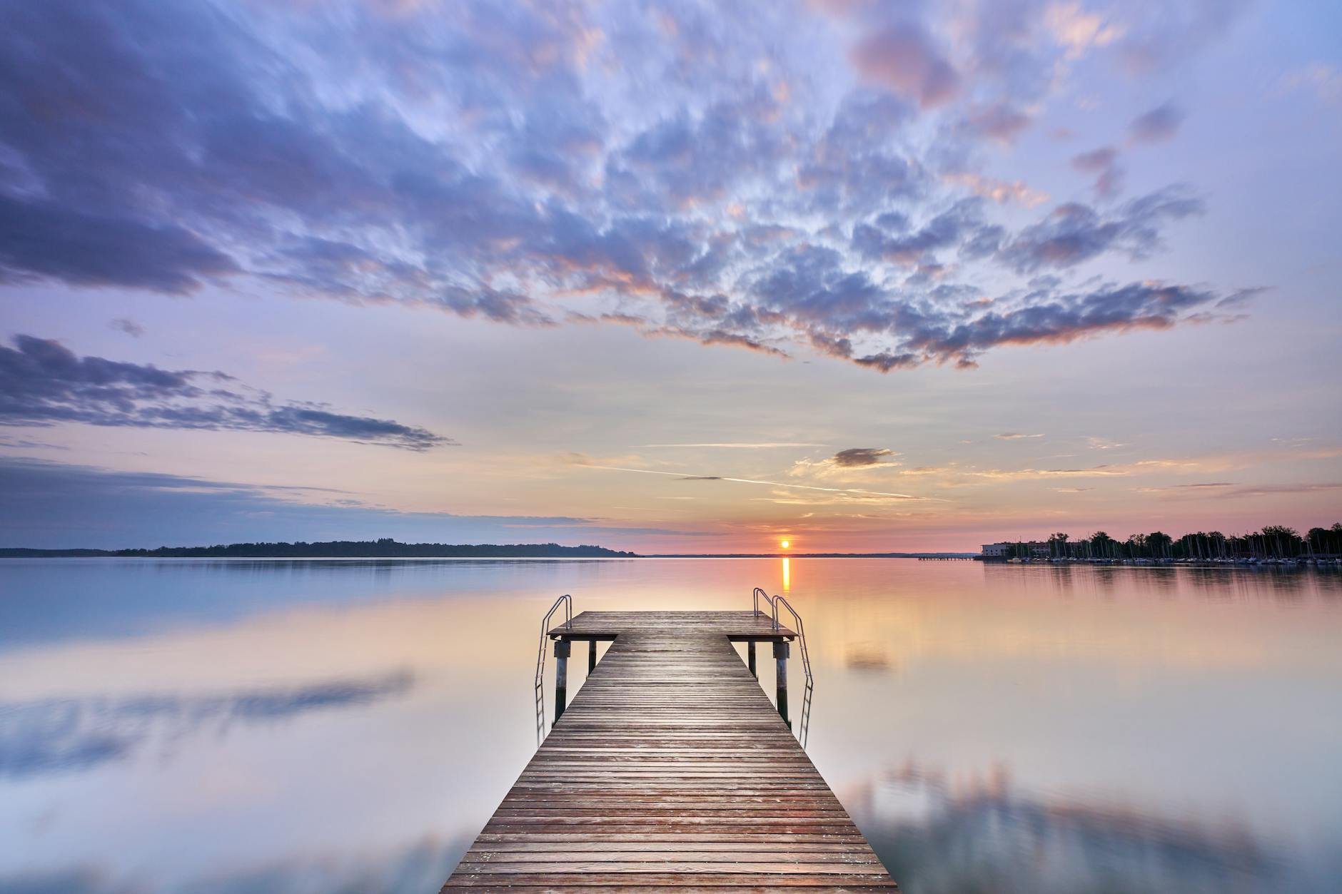 Toronto beaches boardwalk pier sunset lake reflection