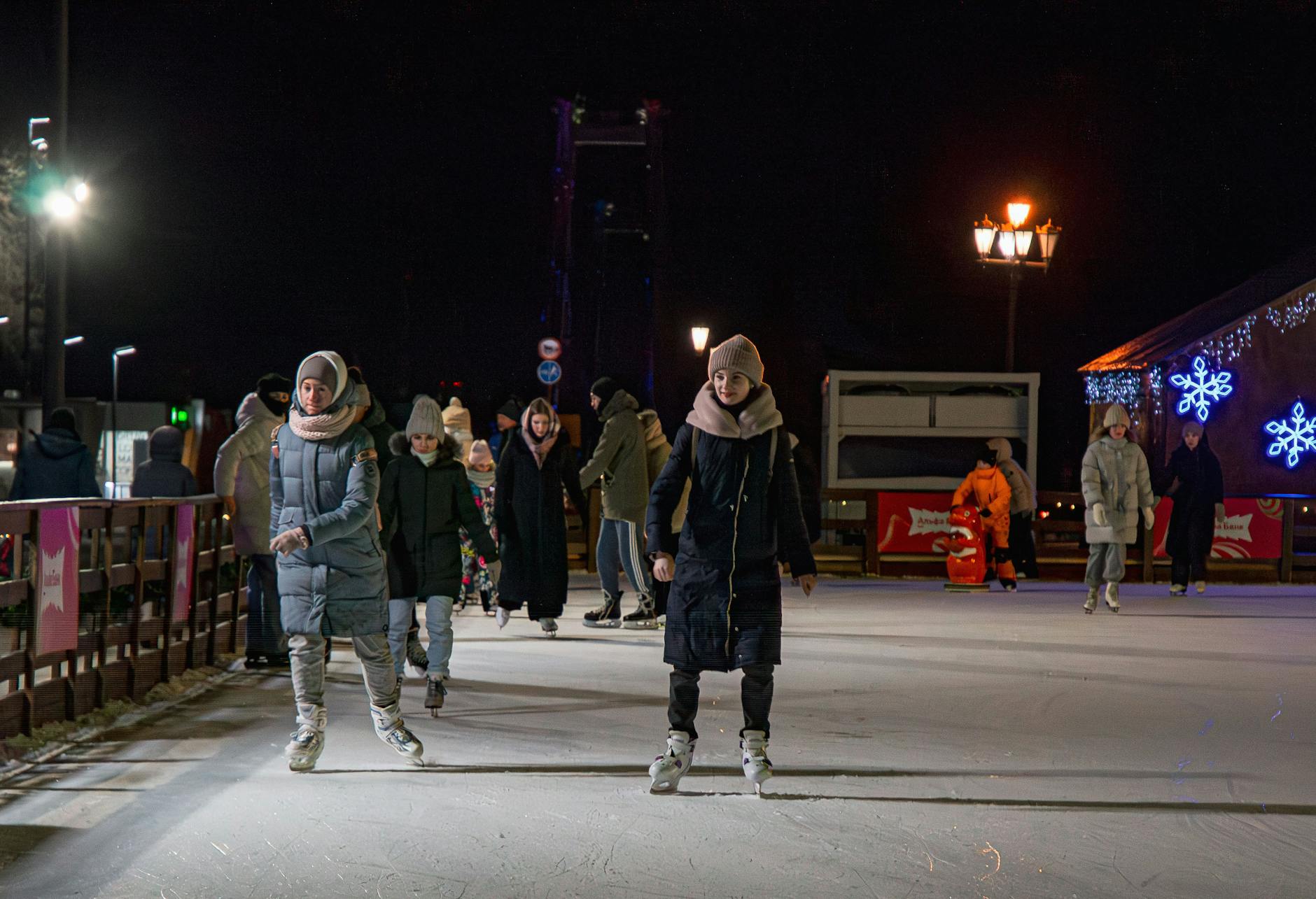 Toronto in winter outdoor skating rink lights families winter evening