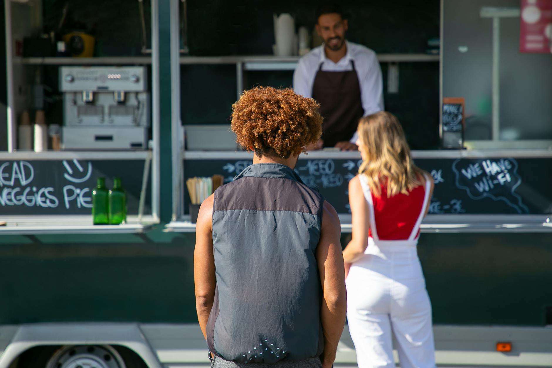 Toronto street food truck with customers and modern menu
