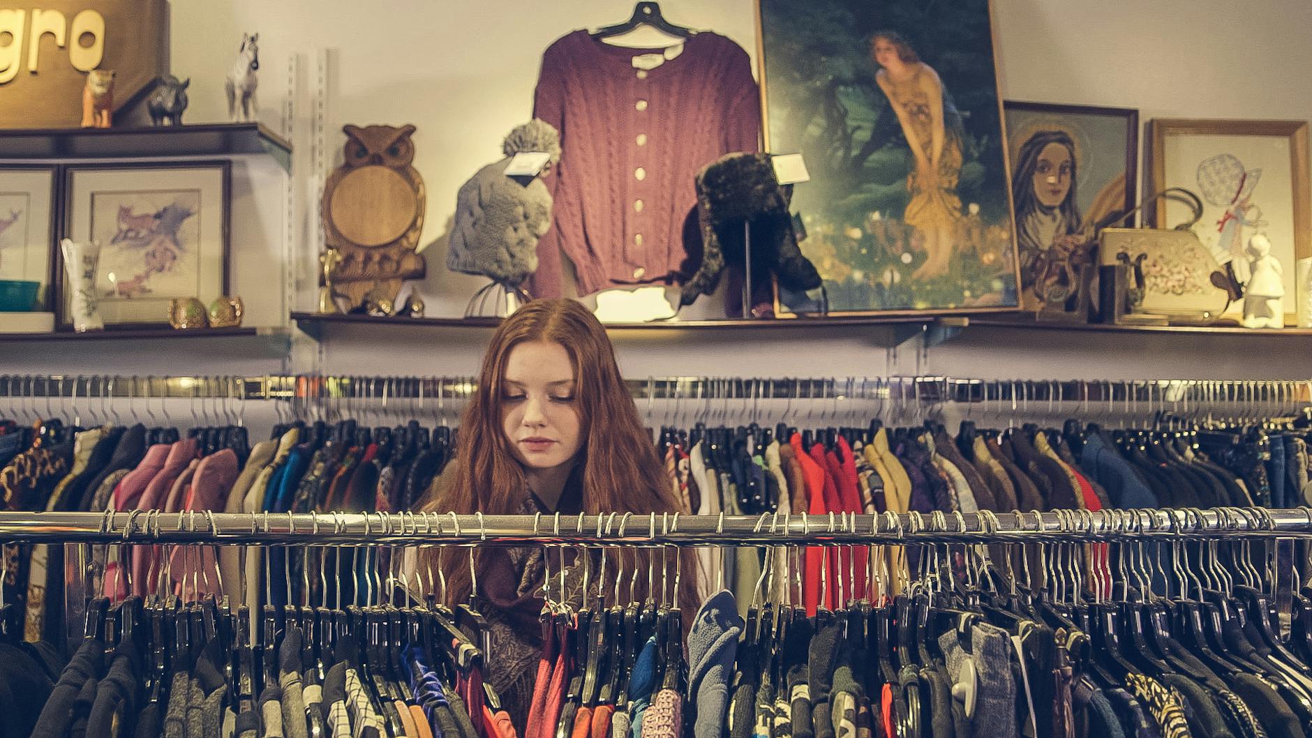 Vintage stores Toronto curated clothing rack racks colourful storefront