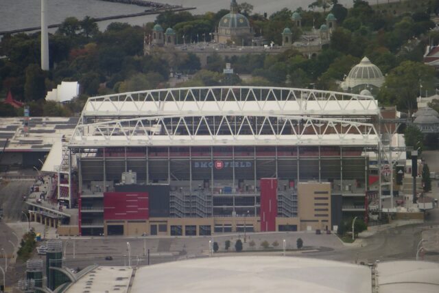BMO Field stadium seen from above with Exhibition Place and Lake Ontario behind it