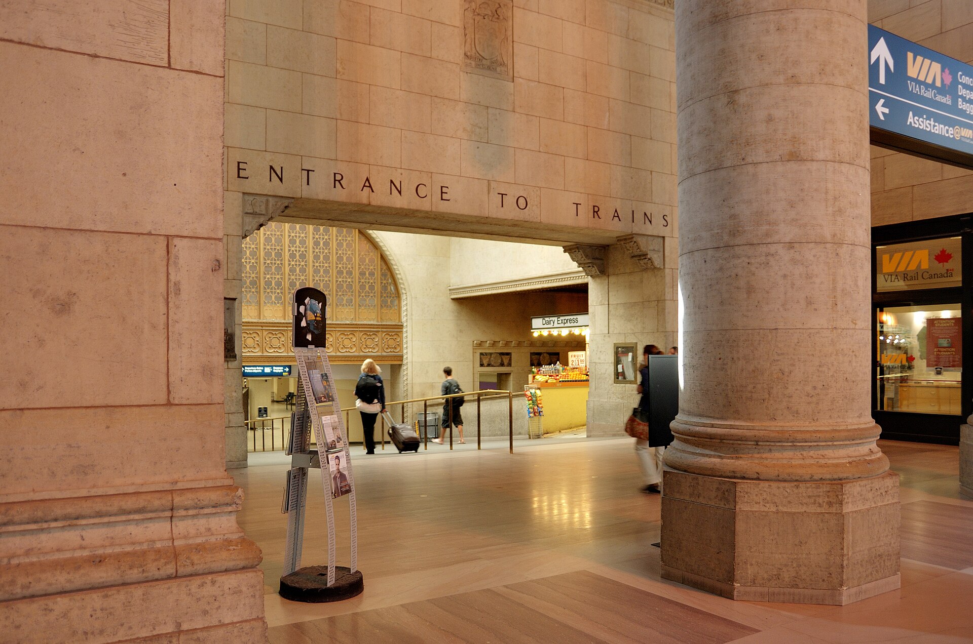 Carved stone doorway at Union Station Toronto with the words Entrance to Trains above it